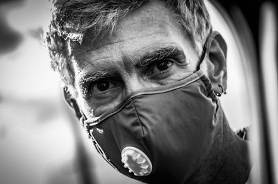 Close-up portrait of man wearing sunglasses