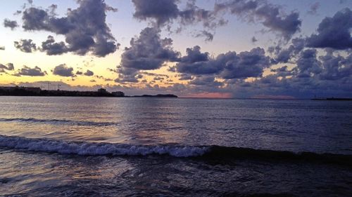 Scenic view of sea against dramatic sky