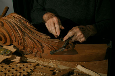 Midsection of man working at home