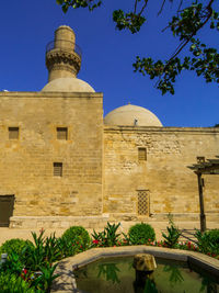 Low angle view of historic building against sky