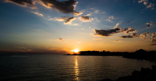 Scenic view of sea at sunset