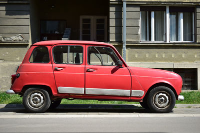 Red renault 4 on a sunny day