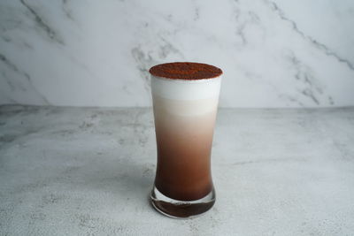 Close-up of coffee cup on table