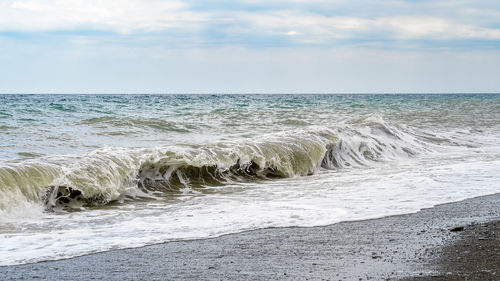 Scenic view of beach against sky