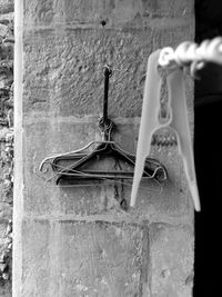 Close-up of chain hanging on wall