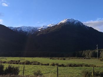 Scenic view of snowcapped mountains against sky