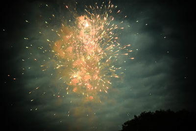 Firework display at night