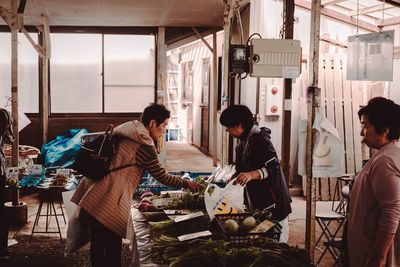 People working in kitchen