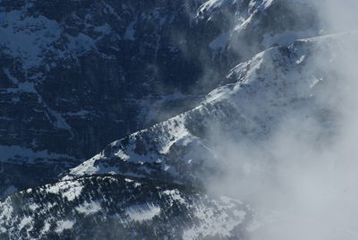 Scenic view of snow covered mountains