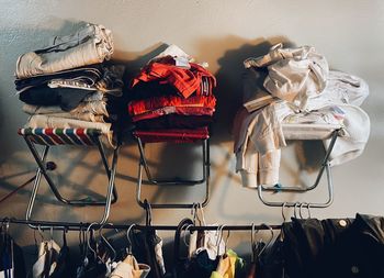 Clothes hanging on display at store