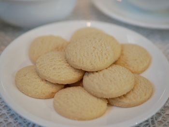 High angle view of cookies in plate on table