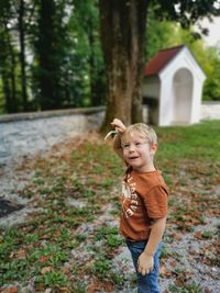 Full length of boy standing on land