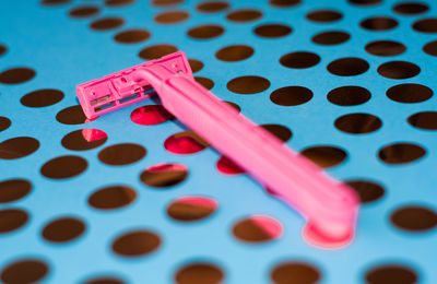 High angle view of pink petals on table