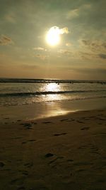 Scenic view of sea against sky at sunset