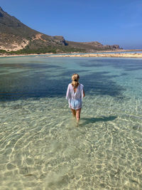 Woman walking in balos lagoon