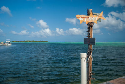 Scenic view of a sign in the caribbean ocean