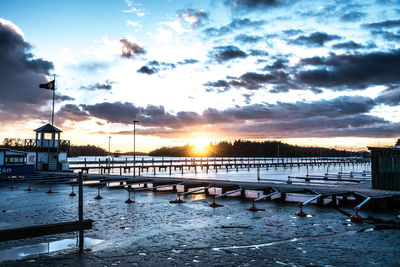 Scenic view of river against sky during winter