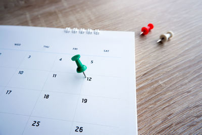 High angle view of paper on table