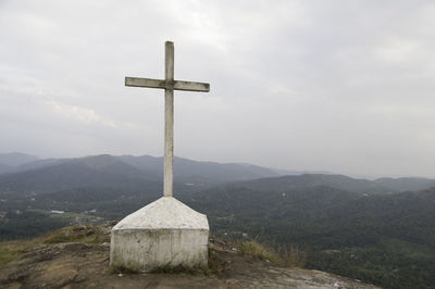 Cross against sky