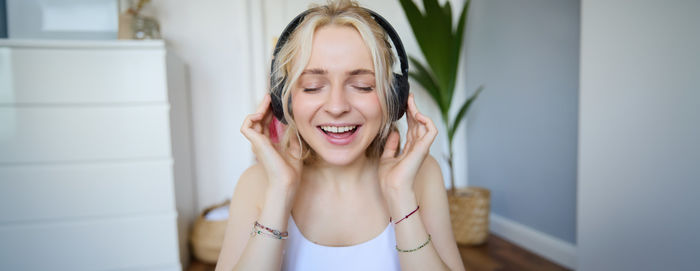 Portrait of young woman with eyes closed