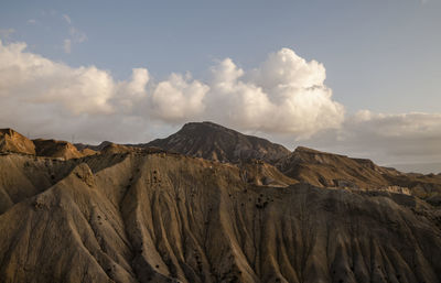 Panoramic view of landscape of tabernas desert in almeria, spain, against cloudy sky