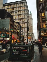 People on street in city