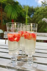 Close-up of strawberry drink in glass on table