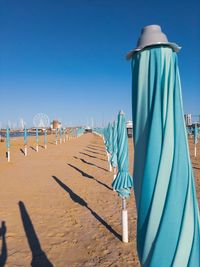 Panoramic view of beach against clear sky