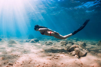 Man swimming in sea