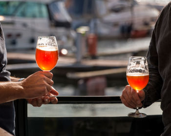 Close-up of hand holding drink