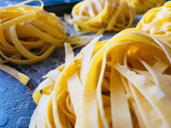Close-up of yellow slices on table