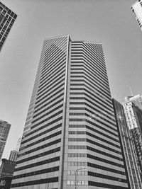 Low angle view of modern buildings against sky