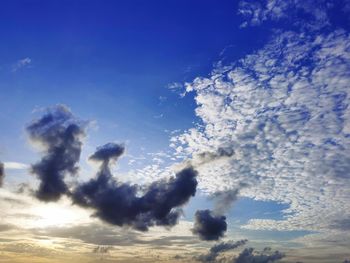 Low angle view of smoke stack against sky