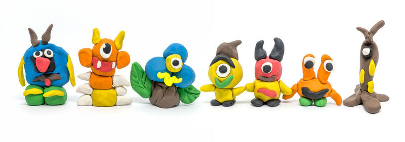 Close-up of toys against white background