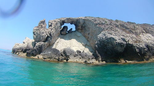 Scenic view of sea against clear blue sky