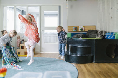 Kids jumping in playschool