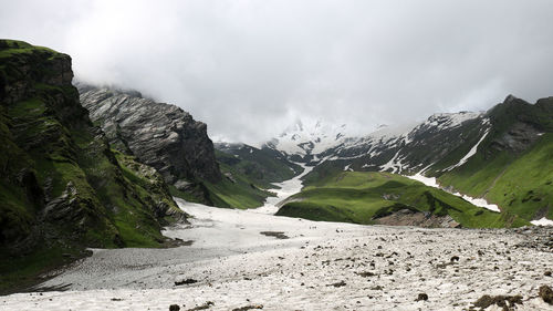 Scenic view of mountains against sky during winter