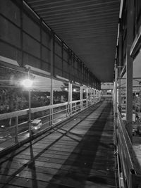 Empty railroad station platform at night