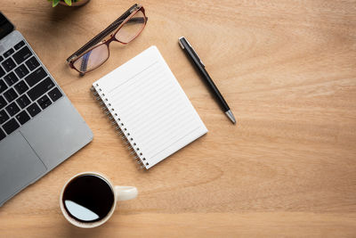 High angle view of coffee cup on table