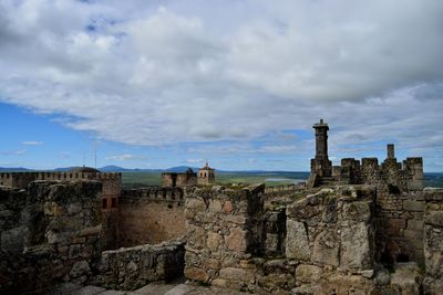 View of castle against clouds