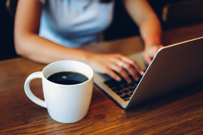 Coffee cup on table