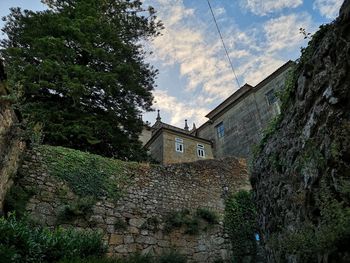 Low angle view of old building against sky