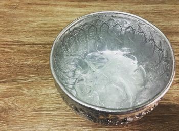 High angle view of water in bowl on table