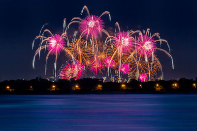 Firework display at night