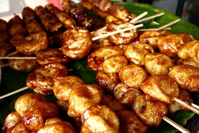 High angle view of meat on barbecue grill