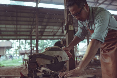 Carpenter working at workshop