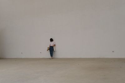 Full length of man standing on floor