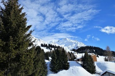 Scenic view of mountains against sky during winter