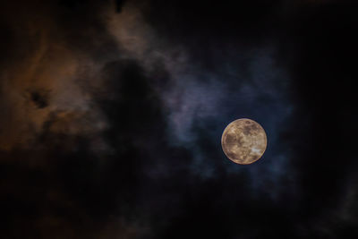 Low angle view of moon against sky
