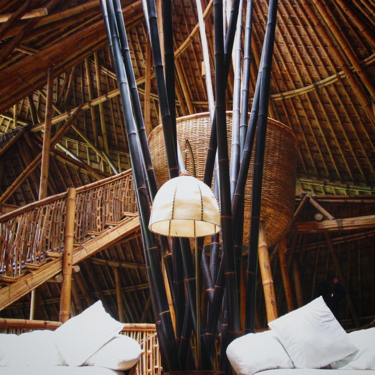 LOW ANGLE VIEW OF ILLUMINATED LAMP HANGING ON ROOF